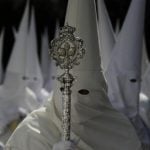 HOODS AND HATS: The long conical hats worn by the members of some brotherhoods during Spain’s Easter celebrations have nothing to do with the Ku Klux Klan. Instead, they originate in the hats worn by people found guilty of religious crimes in the Spanish Inquisition. Those criminals would walk the streets in the hats while they were mocked and insulted by the crowds. By donning the hats in Spain’s Easter celebrations, penitents are also re-enacting Christ’s road to Calvary.Photo: Cristina Quicler/AFP