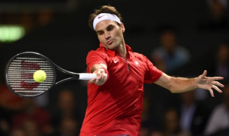 Federer pulls Swiss level after Wawrinka shock