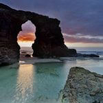 PLAYA DE LAS CATEDRALES (GALICIA): A beach which encapsulates the wild, craggy coastline of Spain’s most easterly region like no other. 'Cathedrals Beach' leaves visitors in awe of its gigantic arch-like rock formations and deep caves. "How amazing mother nature is," wrote one visitor on TripAdvisor. Make sure to find out when it's low tide to be able to explore the beach from ground level.Photo: Shutterstock