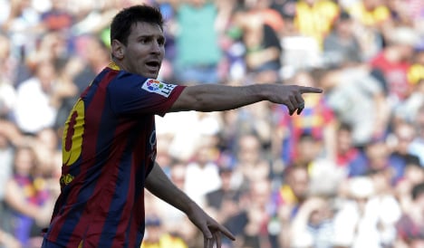 Messi urges Barça to halt Atletico title party