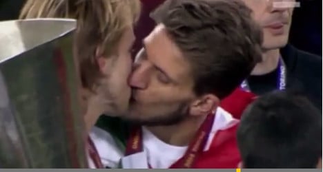 VIDEO: Footballers’ kiss captures world attention
