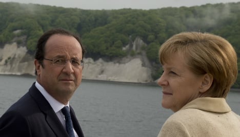 Hollande meets Merkel in bid to warm up ties