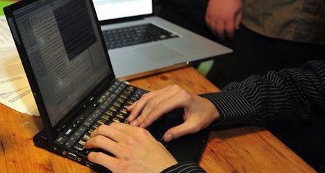 Hacker held in Bangkok over Swiss bank fraud   