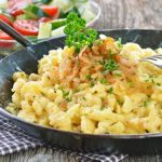 <b>7) Käsespätzle:</b> The pièce de résistance in German cuisine has to be Käsespätzle. Freshly made egg noodles (originally from Baden-Württemberg) mixed with grated cheese and topped with fried onion. They are so good (just not for the waistline) you could eat them every day.Photo: Photo: Shutterstock