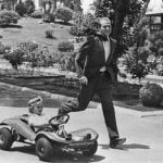 1975: Prince Juan Carlos of Spain plays with his son Don Felipe driving a cart, in the gardens of Zarzuela Palace in Madrid. Photo: AFP