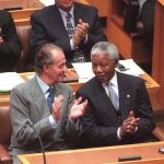 1999: Juan Carlos and South African President Nelson Mandela chat after the Spanish King received a standing ovation on adressing a joint sitting of Parliament in Cape Town.Photo: Sasa Kralj/AFP