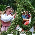 The Maypole must be decorated before it is raised. Photo: The Local/Solveig Rundquist