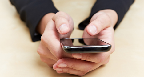 French priest offers smartphone blessings