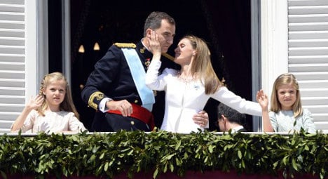 Crowds greet Spain’s new king and queen