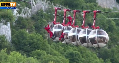 Dozens left hanging after Alps cable cars derail