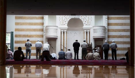 Two men charged over Oslo imam attack