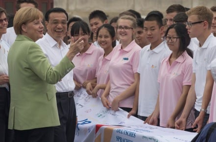 Merkel raises human rights on China trip