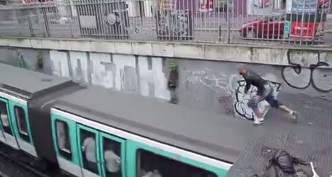 VIDEO: Stuntman jumps onto moving Paris metro