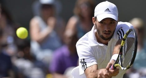 Troicki returns from ban with Swiss Open win