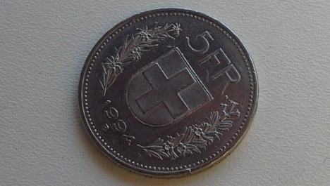 Swiss Post cracks down on fake five-franc coin