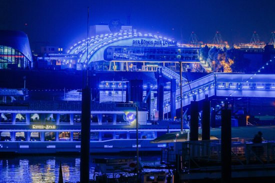 Hamburg harbour lit up in blue