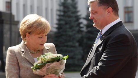 Merkel: Ukraine solution mustn't harm Russia