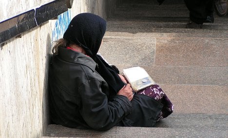 Politician ousted after beggar 'parasite' post