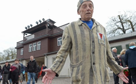 Man gives Hitler salute at concentration camp