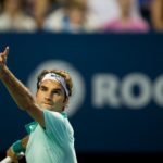 Federer cruises past Lopez to book final spot