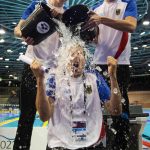 <b>Philip Heintz</b> and <b>Jan-Philip Glania</b> of Germany do the ALS Ice Bucket Challenge with national coach Henning Lambertz at the 32nd LEN European Swimming Championships 2014 at the Velodrom in Berlin, Germany.Photo: DPA