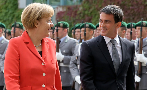 Merkel hails 'impressive' French reform plans