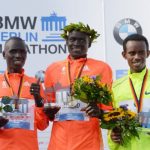 The men's race medalists Dennis Kimetto (Kenya), Emmanuel Mutai (left, Kenya) and Abera Kuma (right, Ethiopia). Photo: DPA