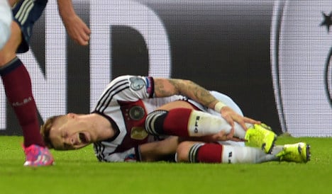 Reus injured in 2-1 win over Scotland