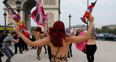 Topless feminists urge 'infidels'  to revolt