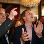 Leader of the AfD party Bernd Lucke, right, cheers for the party during the elections in Brandenburg.Photo: DPA