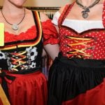 These women need to show themselves a red card. Don't go for a "themed" dirndl, be it a Christmas theme or football World Cup theme as here.Photo: DPA