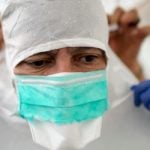 Geneva doctors dress for battle with Ebola virus