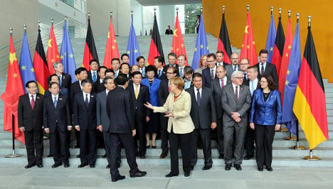 Merkel welcomes China's entire cabinet to Berlin