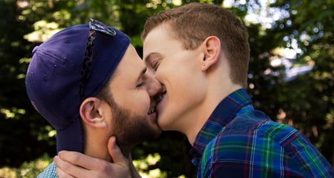 Men face charges over ‘passionate’ public kiss