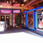 <b>Stripped bare:</b> "Pigalle is an adult entertainment area known for sex shows, prostitution, and illegal drugs. Unsuspecting tourists have run up exorbitant bar bills and been forced to pay before being permitted to leave." (US gov't)Photo: Guilhem Vellut/Flickr