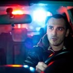 <b>Police protocol:</b> The French are also told not to mess with American cops:  “If an (American) police car with its lights and sirens on appears behind a driver, the driver must immediately pull over and stay in his car, with his hands on the wheel and wait for the police officer.”Photo: Shutterstock