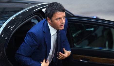 Angry protesters pelt Renzi's car with eggs