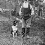The farmer Carl Persson, 69 years old, with a dog. This photo was taken in Gustavsberg. 