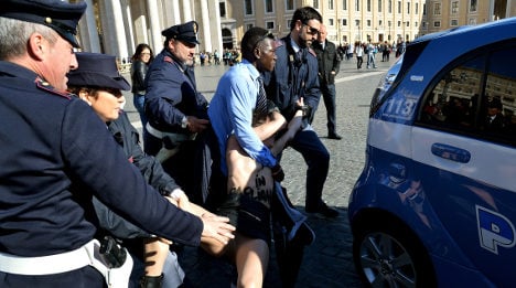Topless feminists target 'political' Pope