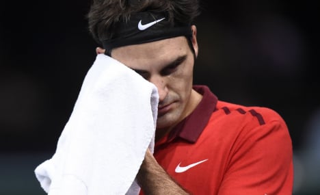 Federer derailed by Raonic at Paris Masters