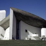 <b>Chapel de Notre Dame de Haut:</b> Designed by Le Corbusier in 1954, the controversy of the Chapel of Notre Dame du Haut in Ronchamp lies not with the original building – as one might have expected of a church shaped liked a mushroom – but with the addition in 2011 of a $16 million visitors' centre and convent by Renzo Piano of Centre Pompidou fame. The dreaded extension was predicted to distract from Le Corbusier's sculptural tour de force – fears that went unfounded, as Piano inserted the new buildings into a grassy slope 300ft from the chapel.Photo: scarletgreen
