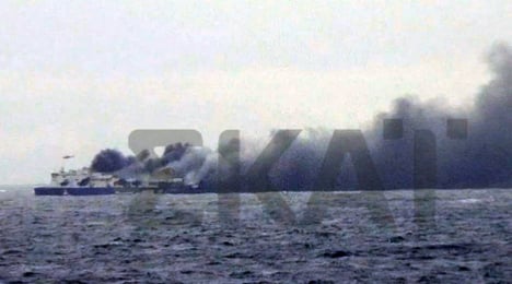 Passengers plead for rescue on burning ferry