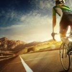 Italian breaks world record for cycling globe