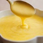 Hollandaise sauce is a tasty blend of egg yolks and butter, usually seasoned with lemon juice, salt and pepper.  Easy to make, and even easier to eat, it's a great way to get kids to eat vegetables, but watch your waistline!Photo: janderson99