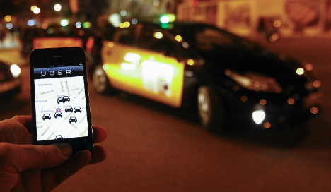 Taxi app Uber defies ban in Spain after ruling