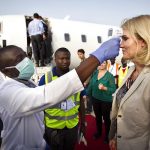 The PM had to undergo mandatory temperature checks before and after entering the Ebola treatment centre.Photo: Nils Meilvang/Scanpix