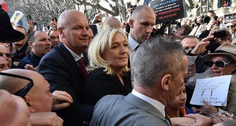 National Front marches alone to defend 'liberty'