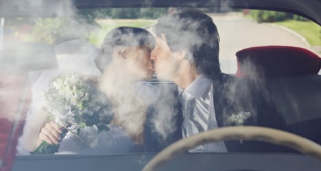 Woman fined for being kissed while driving