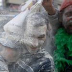 People enjoy the "Domingo Fareleiro" (floury Sunday in Galician language) carnival festival in the village of Xinzo de Limia, northwestern Spain, on January 25th, 2015. During this festive battle participants throw flour against each other as a kind of purification ritual.Photo: Miguel Riopa/AFP