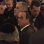 François Hollande as well as several ministers including the PM Manuel Valls and Israeli Prime Minister Benjamin Netanyahu went to the Synagogue de Paris to pay respects to the four victims of the shooting at the kosher store where they were cheered.Photo: Screengrab: AFP